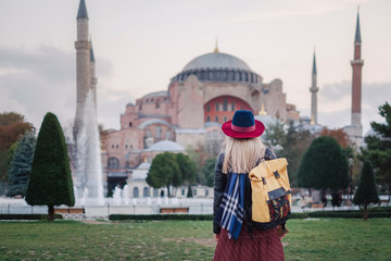 Woman traveling in Istanbul near Aya Sofia mosque, Turkey