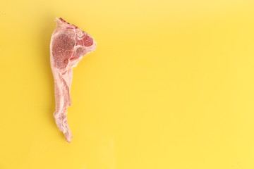 frozen lamb ribs on colorful background