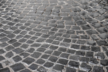 old pavement during the rain