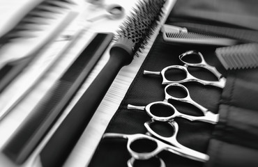 Stylish professional barber scissors and combs, hairdresser salon concept, hairdressing tool set. Haircut accessories  - 241434047