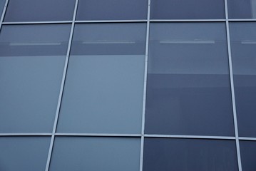 gray glass texture from multiple windows on the wall