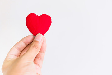 Obraz premium man holding hands heart on white background