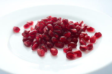 pomegranate grains on a plate
