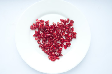 pomegranate grains on a plate