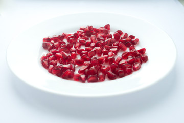pomegranate grains on a plate