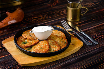 Draniki - potato fritters. potato pancakes. The naitonal dish of Belarus, Ukraine and Russia