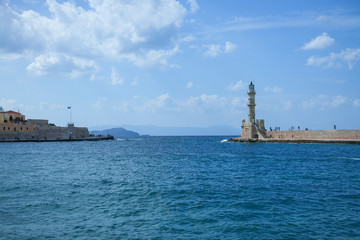 Beautiful cityscape and lighthouse. View of the old port of Chania, Crete, Greece.