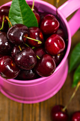 Cherry in Watering Can. Selective focus.