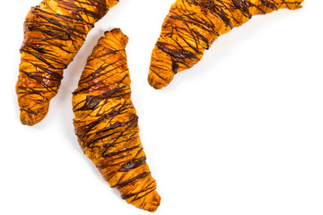 Chocolate Croissants Isolated on White Background. Selective focus.