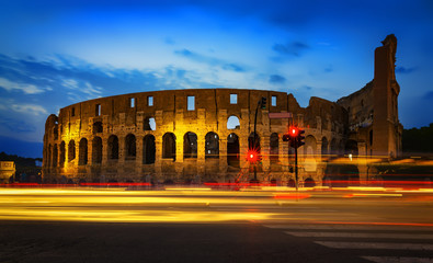 Colosseum and car lights