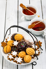 Assorted Mixed Cookies, Variety Flavors with Tea. Selective focus.