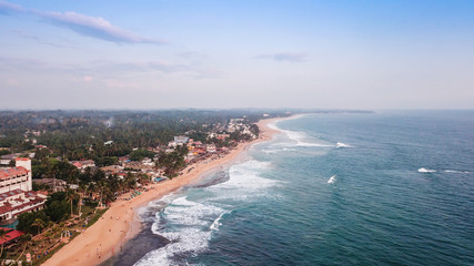 Fototapeta na wymiar Ocean coast in Sri Lanka from the height of bird flight