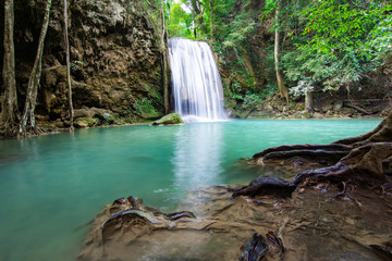 Obraz premium Erawan Falls (The third waterfall – Pha Nam Tok) with emerald green pond in Erawan National Park.