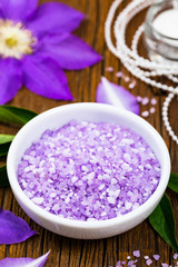 Fototapeta na wymiar Purple Clematis Spa Salt for Spa and Aromatherapy. Selective focus.