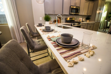 Place Settings On Counter Top In Modern Kitchen