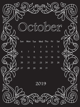 White Chalk drawing mandala doodles frame monthly calendar of 2019 year on black board
