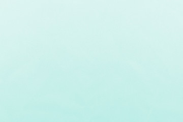 Elegant mint textile background. Silk cloth texture. Fabric pattern.