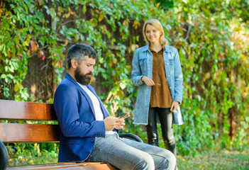 Park best place for romantic walk. Great date tips. Love relations romantic feelings. Romantic concept. Couple in love romantic date walk nature park background. Man bearded hipster wait girlfriend