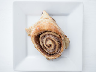 Large cinnamon bun roll. A sugar filled and unhealthy breakfast or brunch choice. 