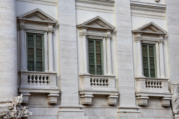 Fototapeta na wymiar Windows of the Palazzo Poli (Poli Palace). Rome, Italy