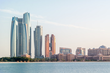 Fototapeta na wymiar Beautiful view of Abu Dhabi city beach, famous Etihad towers and buildings