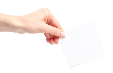 White note paper in hand on white background isolation