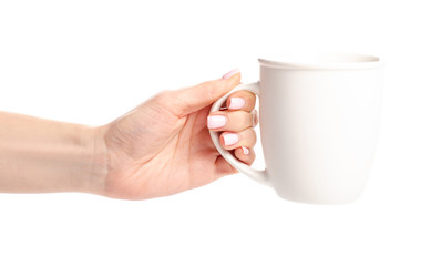 White cup mug in hand on white background isolation