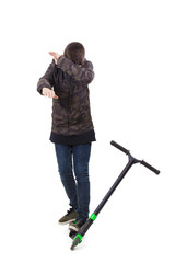 young teenager with isolated scooter in white background