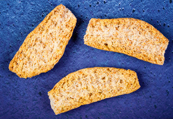 crackers with pieces and crumbs