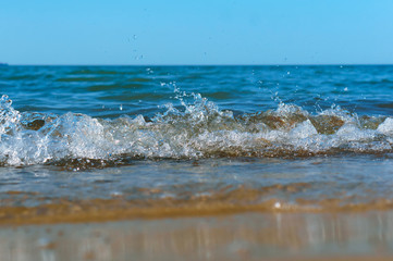 Sea coast. Waves and storms at sea. Waves on the Baltic Sea.