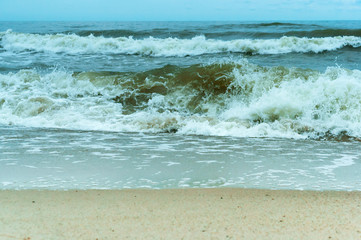 Sea coast. Waves and storms at sea. Waves on the Baltic Sea.
