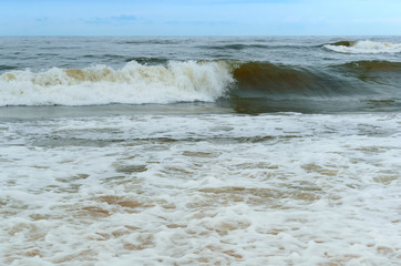 Sea coast. Waves and storms at sea. Waves on the Baltic Sea.