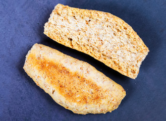 crackers with pieces and crumbs