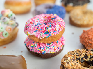 Colorful pink sprinkle donuts from a  Portland, Oregon doughnut shop