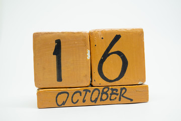 october 16th. Day 16 of month, handmade wood calendar isolated on white background. autumn month, day of the year concept