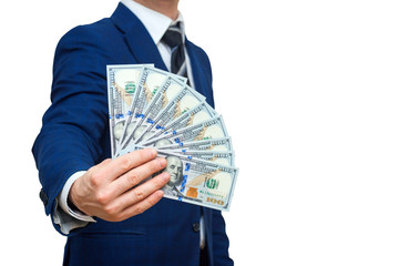 Businessman holding Money Cash Dollars in hands of passing them to the client. Businessman giving money, united states dollar bills