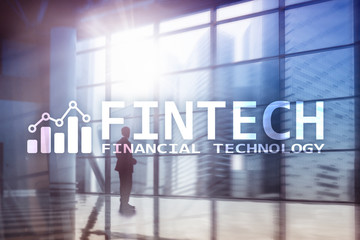 FINTECH - Financial technology, global business and information Internet communication technology. Skyscrapers background. Hi-tech business concept