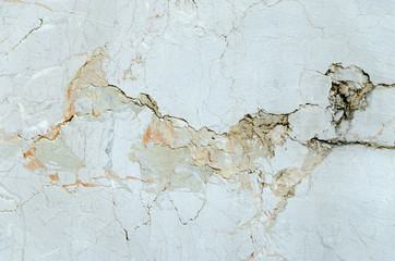 Cut of natural limestone with colour patterns and disseminations surface