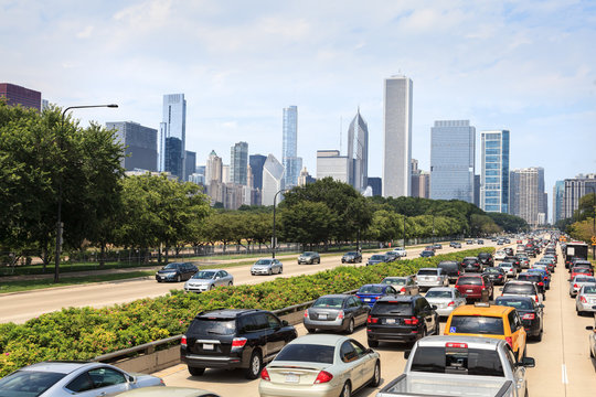 Cars driving on Lake Shore Drive with downtown Chicago shown in the background