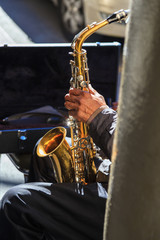 Fototapeta na wymiar Trumpet player playing jazz song on New Orleans street corner