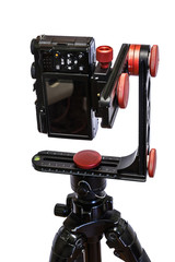 panoramic head for a tripod for the making of virtual tours and full seamless 360 degrees angle panoramas without parallax and distortion isolated on white background with mirrorless camera