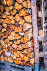 Pile of chopped fire wood prepared for winter