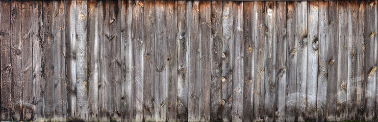 Naklejka premium Brown wood colored plank wall texture background