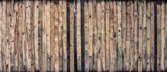 Brown wood colored plank wall texture background