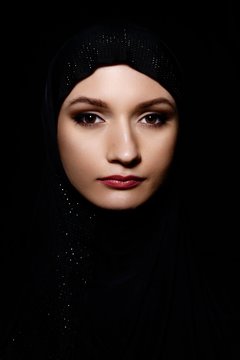Young Arabian Muslim woman in hijab, studio shot