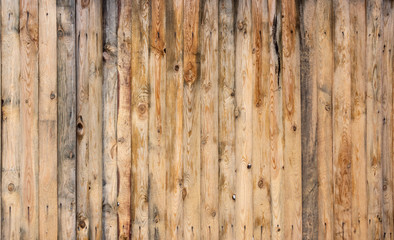 Fototapeta na wymiar Multicolored wooden surface with old faded paint texture