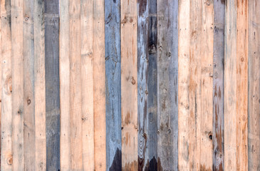Multicolored wooden surface with old faded paint texture