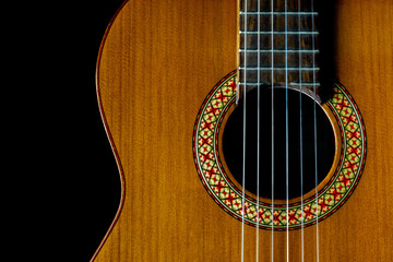 Obraz premium Manuel Rodriguez Model A classical guitar dark closeup, copy space