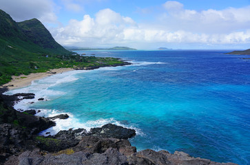 Landscape view of the shoreline and Pacific Ocean at Makapuʻu Point on the Eastern coast of...