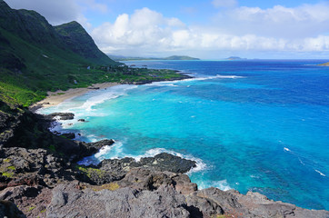 Landscape view of the shoreline and Pacific Ocean at Makapuʻu Point on the Eastern coast of...